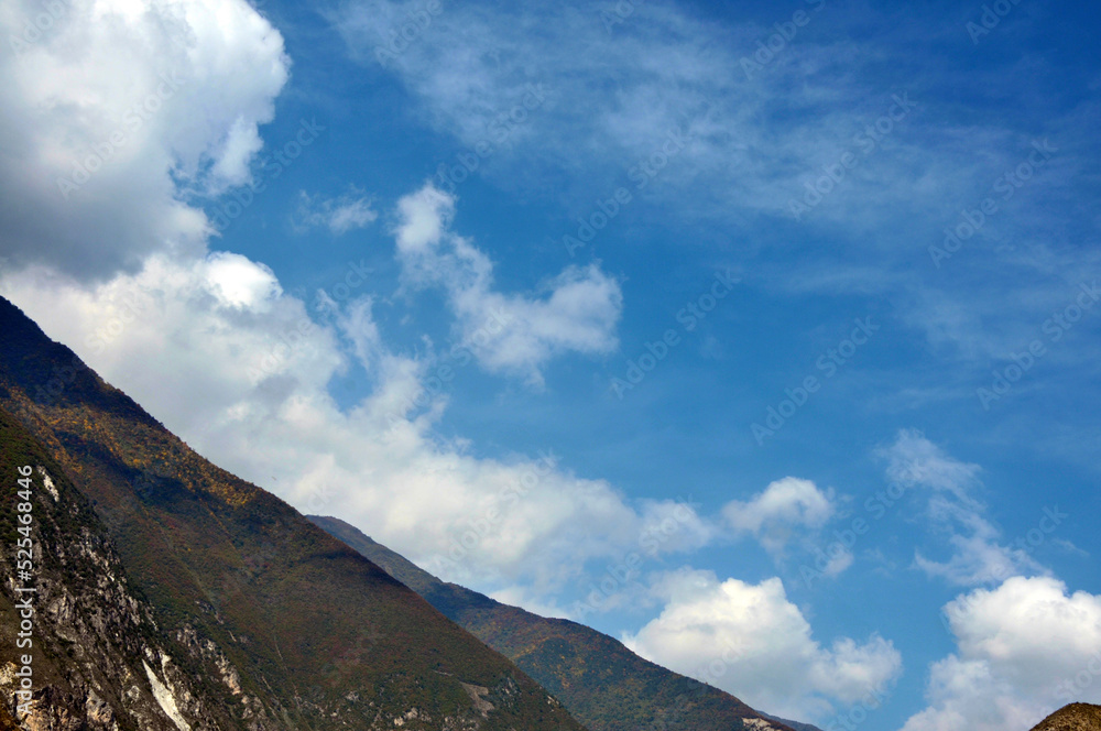 Fototapeta premium clouds over the mountains