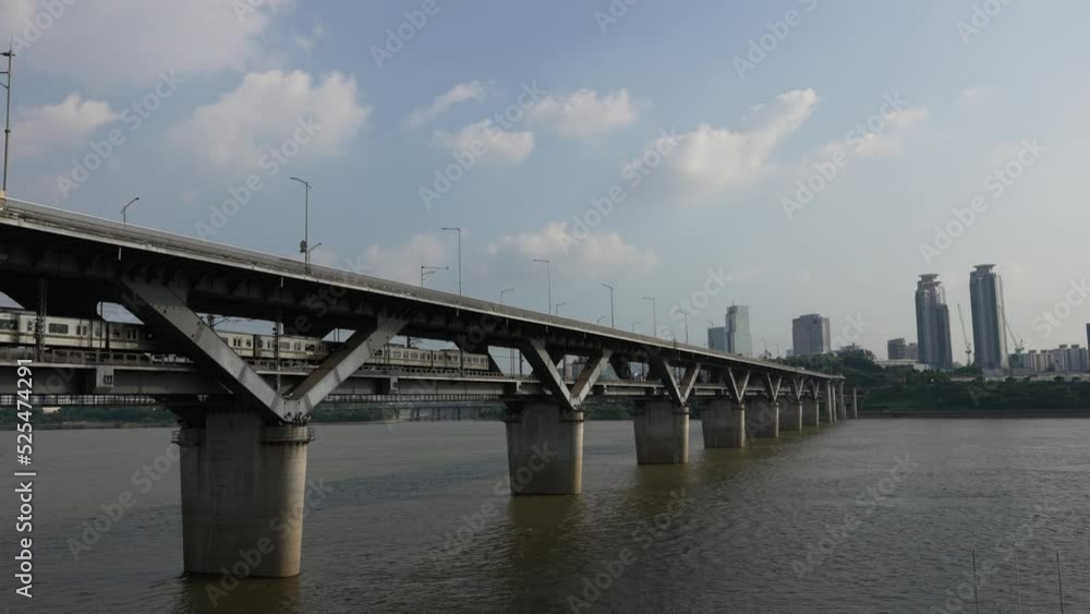 Seoul Subway Train Crossing Han river on Cheongdam Bridge in capital city of South Korea Seoul Subway Train Crossing Han river on Cheongdam Bridge in capital city of South Korea