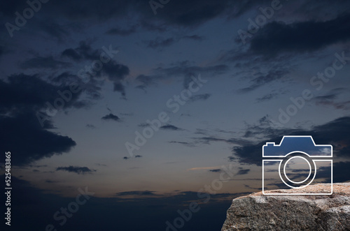 Camera flat icon on rock mountain over sunset sky, Business camera service concept