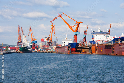 Shipyard in Gothenburg with a ships and cranes