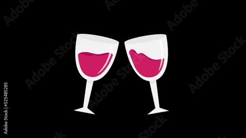 Two glasses of red wine toasting each other while the liquid inside them is moving. photo