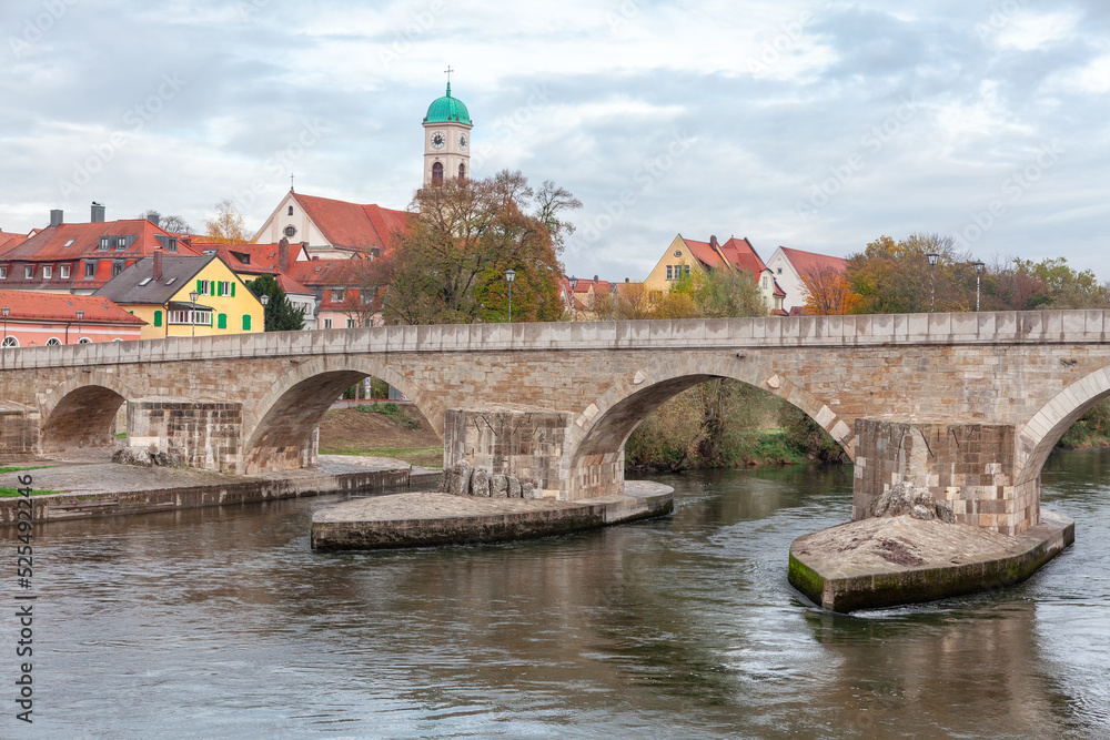 Bridge over Danube in Regensburg Germany . Medieval Arch bridge over the river . Steinerne Brucke