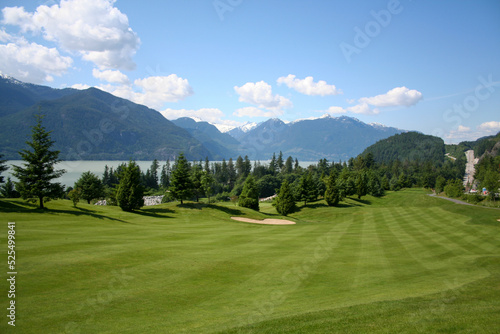 Golf course fairway with beautiful moutain scenery overlooking the Howe Sound in Squamish British Columbia Canada. © John