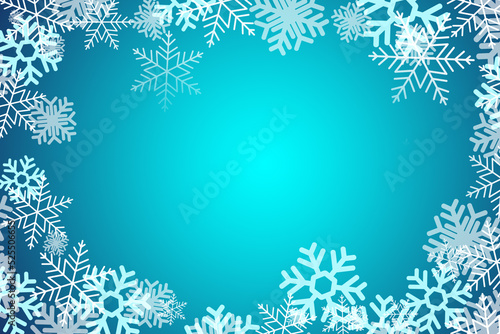 Frame made of snowflakes on blue background. Space for text