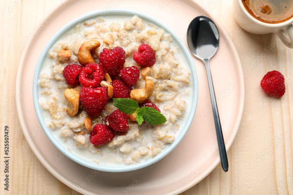 Flat lay composition with tasty oatmeal porridge on wooden table. Healthy meal Flat lay composition with tasty oatmeal porridge on wooden table. Healthy meal