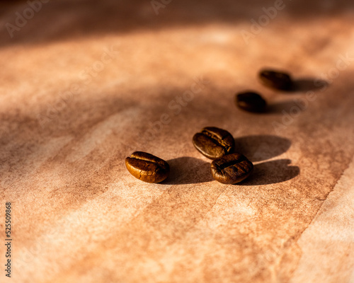 Coffee beans on a brown background