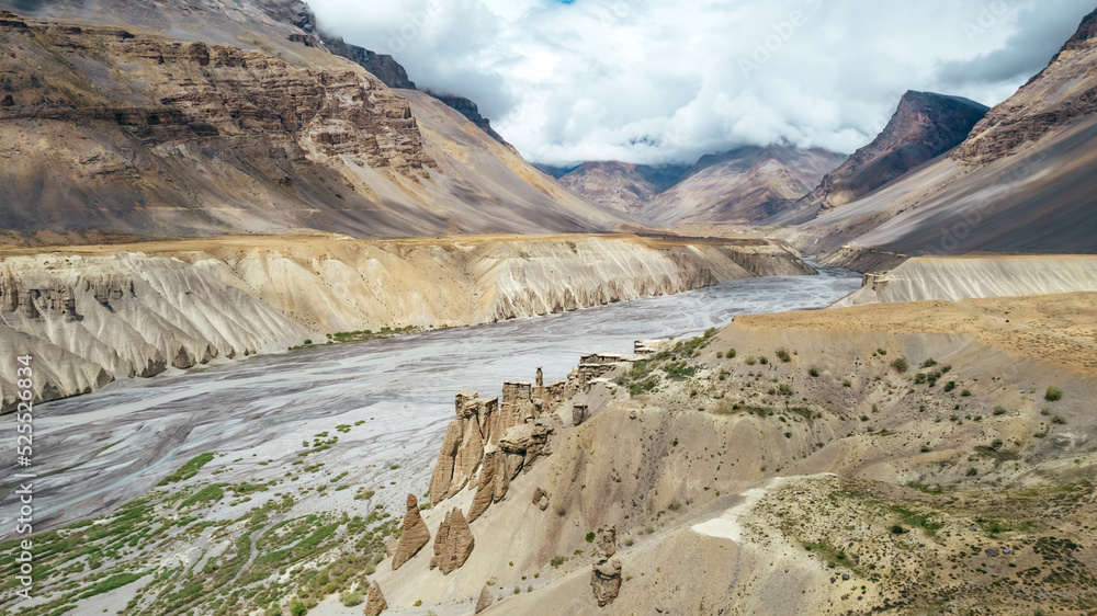 Himalayan Mountain peaks landscape at Spiti Valley River viewpoint in India on sunny day, aerial