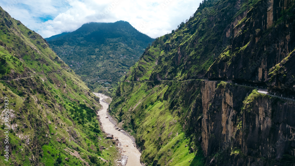 wide aerial landscape of Sutlej River and curvy mountain road at Tranda Dhank in Himachal Pradesh