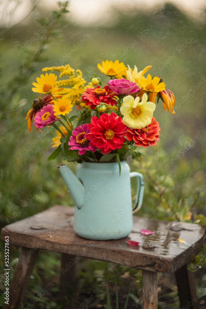 Fototapeta premium Still-life. Photo of a bouquet of bright summer flowers.