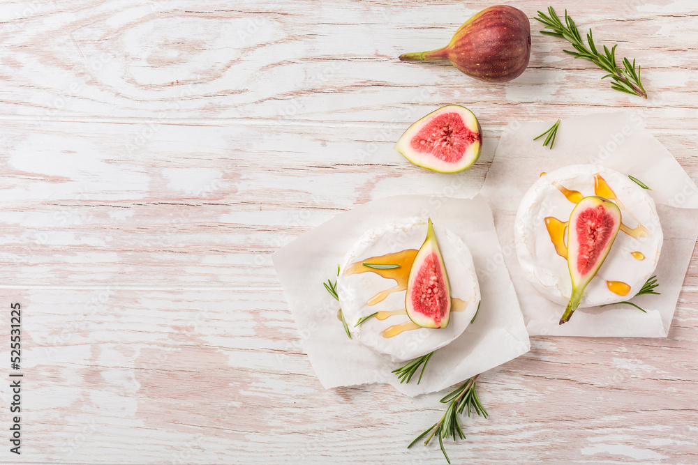 Camembert cheese with honey and fresh figs and rosemary Camembert cheese with honey and fresh figs and rosemary