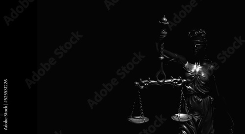 Silhouette of lady Justice with scales of truth. Conceptual image of justice, law and legal system. Copy space.