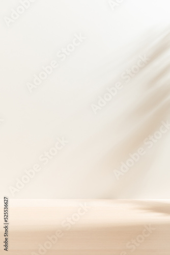 Fototapeta Naklejka Na Ścianę i Meble -  Vertical blank warm lighting background. White and Wooden surface. Light and Shadow wallpaper. Space for text. Backdrop. Studio photography.