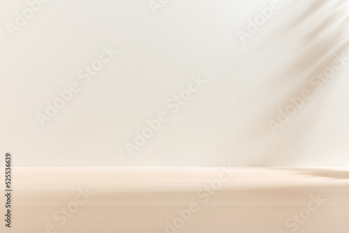 Blank warm lighting background. White and Wooden surface. Light and Shadow wallpaper. Space for text. Backdrop. Studio photography