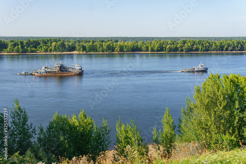 Dredger towing on the river