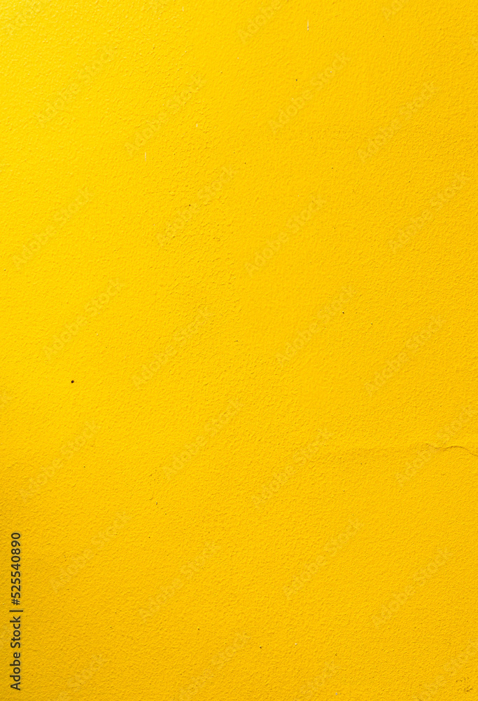 Yellow background, damaged wall, energetic colors, summer texture.