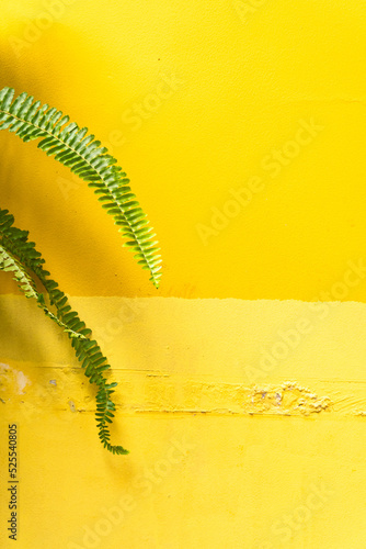 Obraz na płótnie Yellow background, damaged wall, energetic colors, summer texture. w salonie