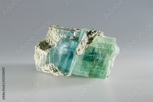 Brucite mineral magnesium hydroxide, fused green blue crystals. Museum Mineral Series. Mineralogical sample
