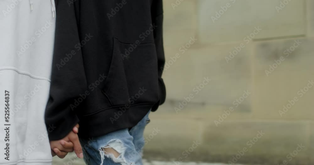 CU TS Female couple holding hands in city CU TS Female couple holding hands in city