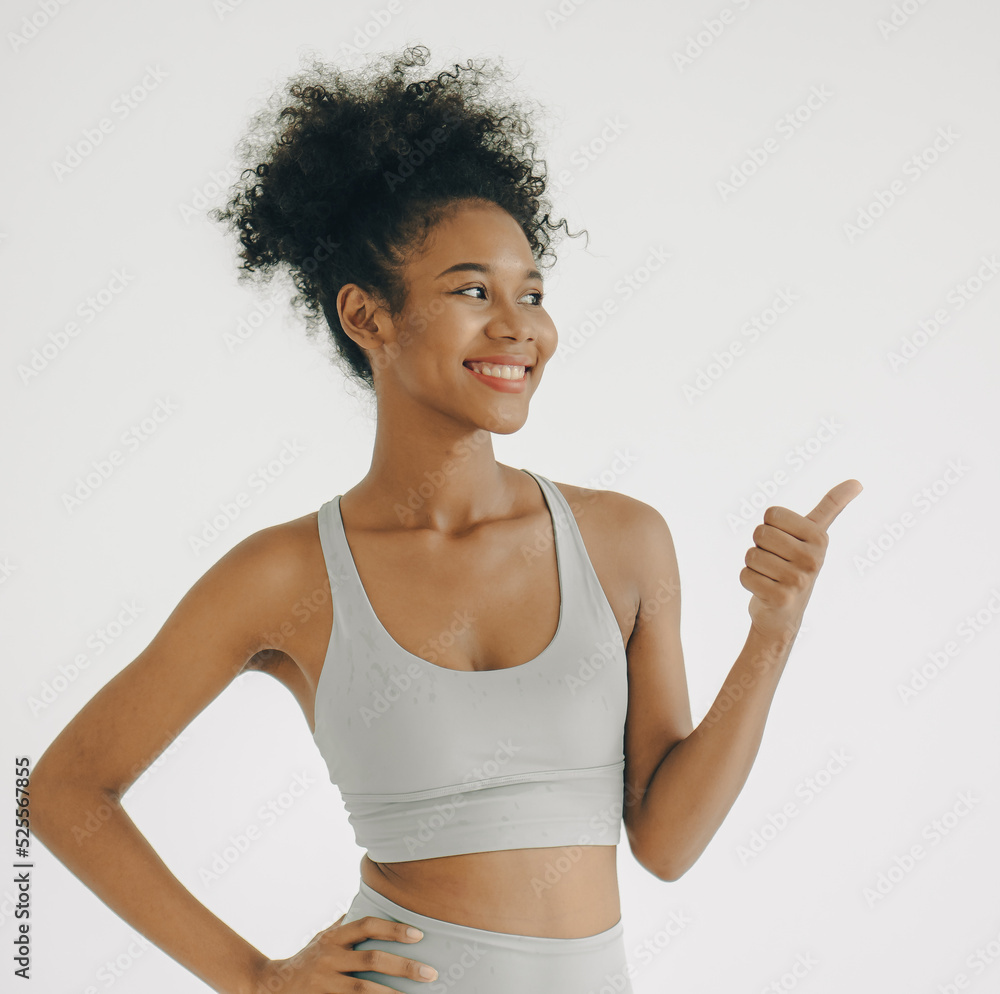 Portrait of happy beautiful afro hair woman smiling face. Cheerful attractive multiracial friendly girl model with curly hair confidently smile while standing isolated on white background. copy space. Portrait of happy beautiful afro hair woman smiling face. Cheerful attractive multiracial friendly girl model with curly hair confidently smile while standing isolated on white background. copy space.