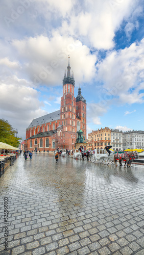 Amazing cityscape of Krakow with St. Mary's Basilica on Main Square. photo