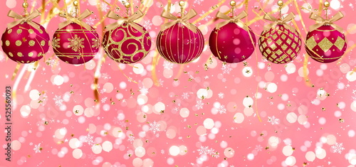 festive Christmas red ball wint gold confetti on pink blurred bokeh background 