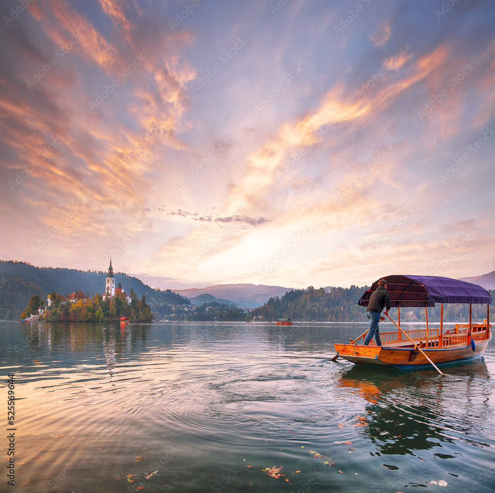 Stunning sunset view of popular tourist destination  Bled lake.