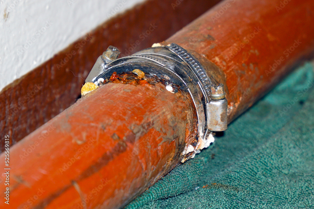 Clamp patch on a leaking water pipe. Selective focus Stock Photo