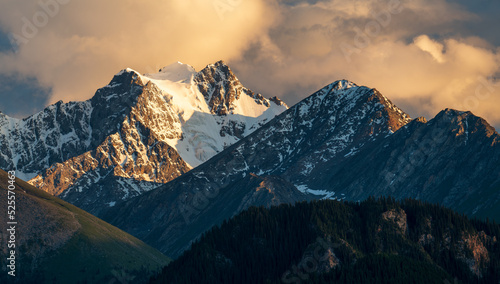 sunset over the snow mountains