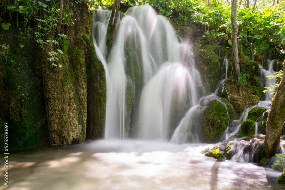 Fototapeta premium Beautiful paradise. Blue lake and cascade in the forest, Plitvice lakes, Croatia.
