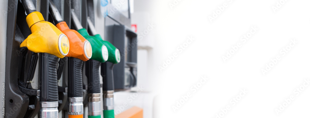 gas pump nozzles at gas station with copy space banner format
gas pump nozzles at gas station with copy space banner format