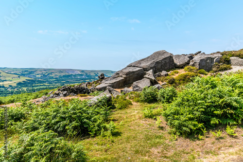 A view of a millstone rock cluster on the top of the Bamford Edge escarpment in summertime