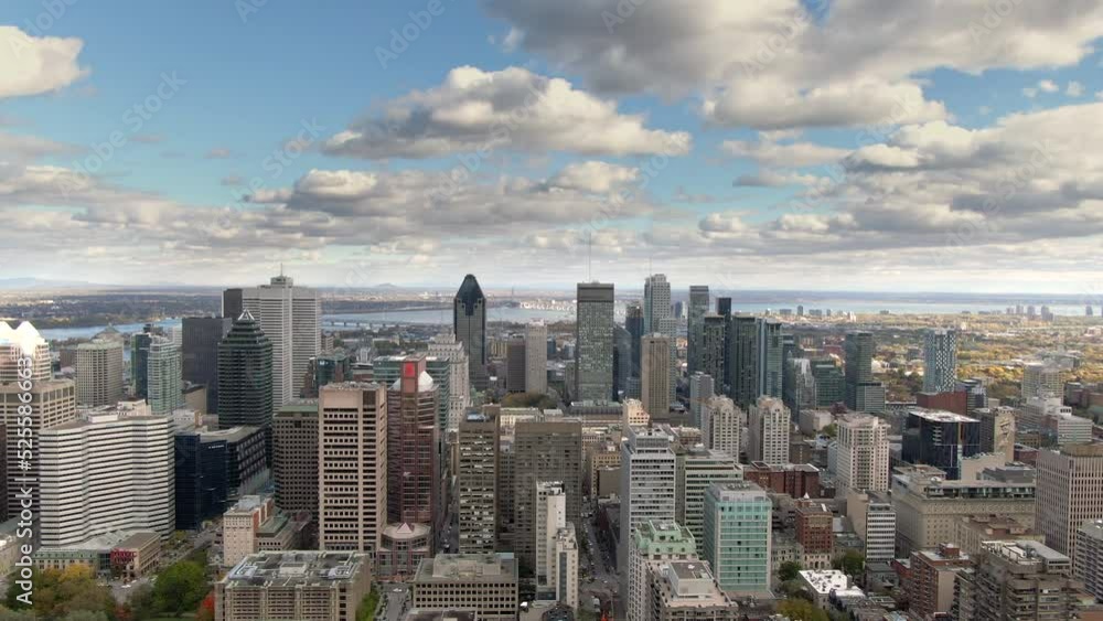Establishing shot of Montreal, Quebec, Canada, aerial panoramic view of high rise buildings in the financial district during fall season. Establishing shot of Montreal, Quebec, Canada, aerial panoramic view of high rise buildings in the financial district during fall season.
