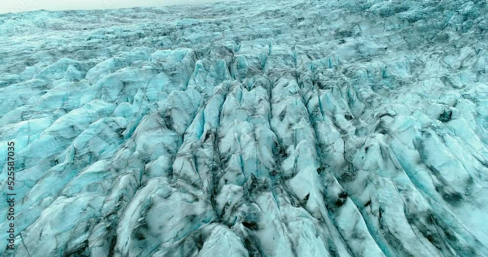 Drone taking closely view of a large amazing glacial sheet. Drone taking closely view of a large amazing glacial sheet.