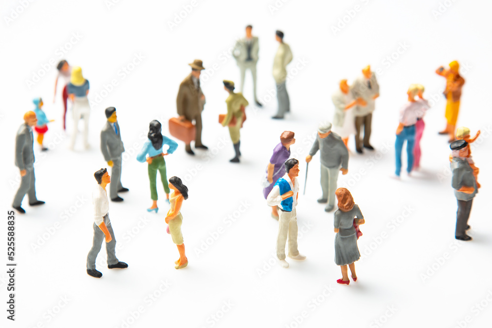 miniature people. different people stand on a white background. communication of society of different generations miniature people. different people stand on a white background. communication of society of different generations