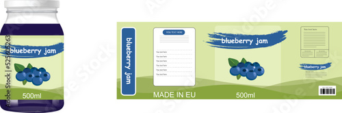 Beautiful jar of blueberry jam and a label isolated on the white background