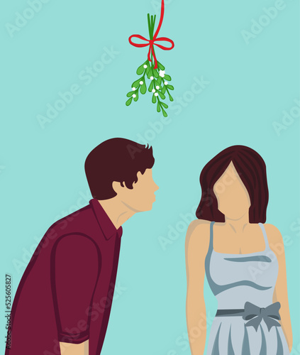 Silhouette of couple are kissing under the mistletoe