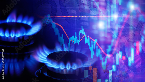 Natural gas cost growth concept with gas burners and stock charts