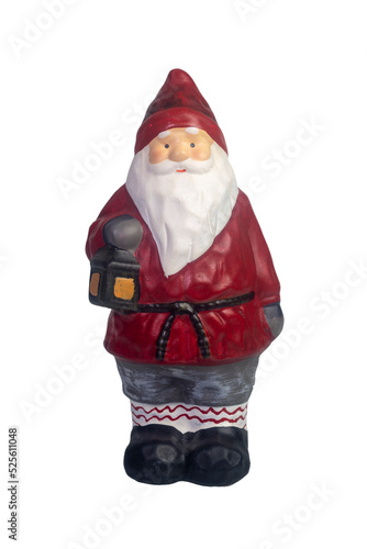 Santa Claus figurine isolated on a white background. Merry Christmas and Happy new Year concept. photo