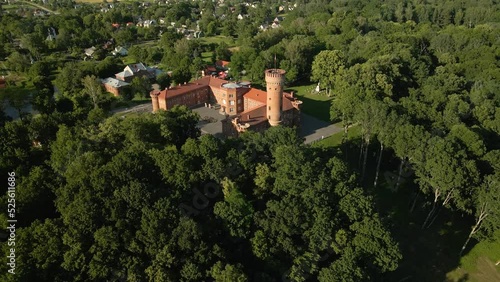 Aerial view of the Raudones castle in Lithuania on a sunny day photo