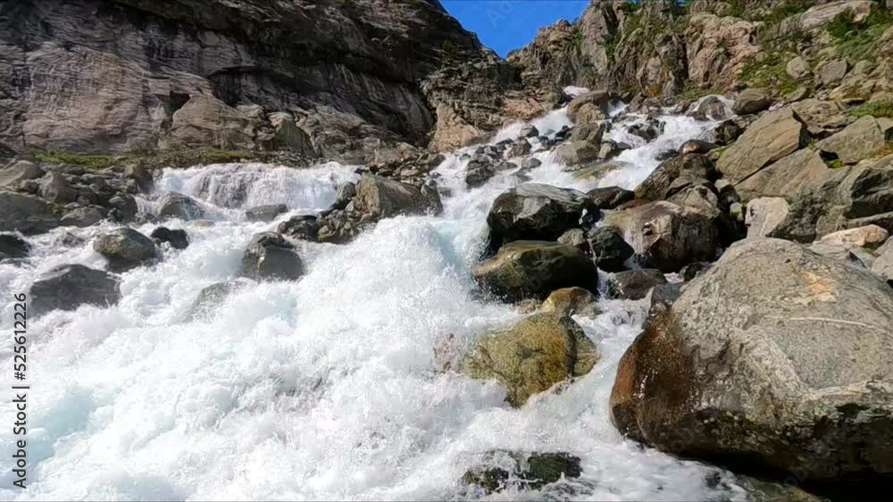Beautiful mountain landscape with a stream at the Buarbreen glacier, Norway Beautiful mountain landscape with a stream at the Buarbreen glacier, Norway