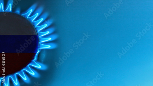 blue natural gas flame with space for text on light blue background photo