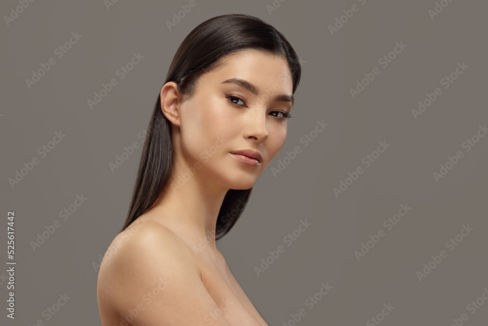 Attractive female asian model with healthy skin portrait. Attractive female asian model with healthy skin portrait.