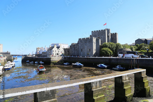 A view of Rushen Castle from across the harbour in Castletown on the southern coast of the Isle of Man. photo