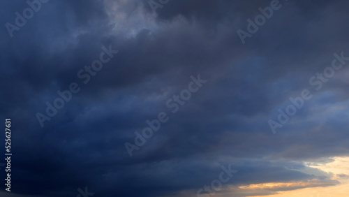 massive dark rain storm clouds backdrop for weather forecast - abstract 3D rendering