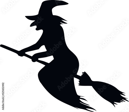 Silhouette of a witch on a broomstick in flight