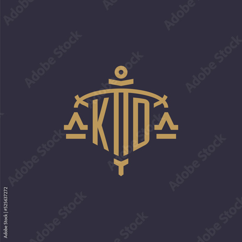 Monogram KD logo for legal firm with geometric scale and sword style