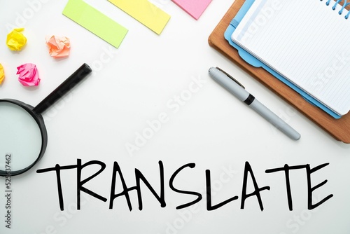 TRANSLATE text on white background with office and school supplies photo