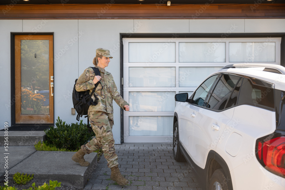Naklejka premium Air Force service member gets ready for work and leaves.