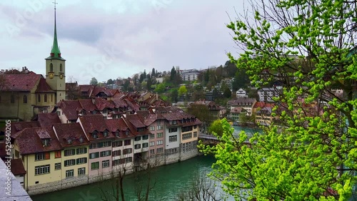 The dense housing of old Bern and fast flowing River Aare, Switzerland photo