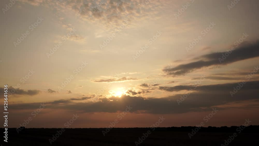Beautiful sunset. The sun goes behind the clouds. Landscape. Sunset on the field. Beautiful sunset. The sun goes behind the clouds. Landscape. Sunset on the field.